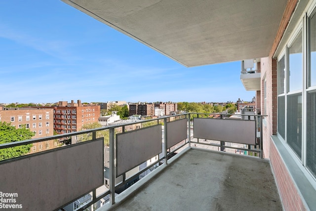 balcony featuring a city view