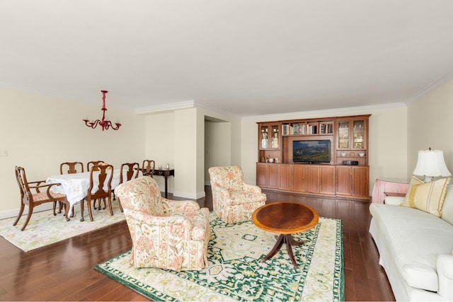 living area featuring baseboards, ornamental molding, and dark wood-style floors