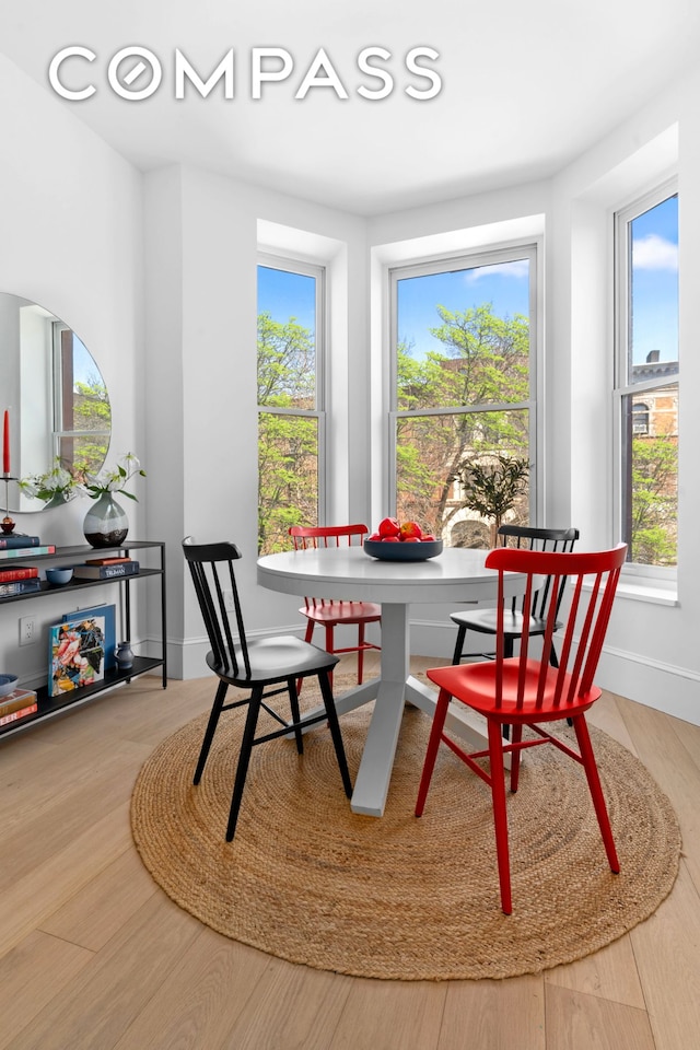 1370 Dean St Unit B, New York City, NY 11216 - dining area featuring plenty of natural light and wood finished floors
