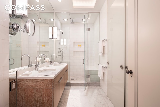 565 Park Ave Unit 2, New York City, NY 10065 - bathroom featuring a shower stall and double vanity