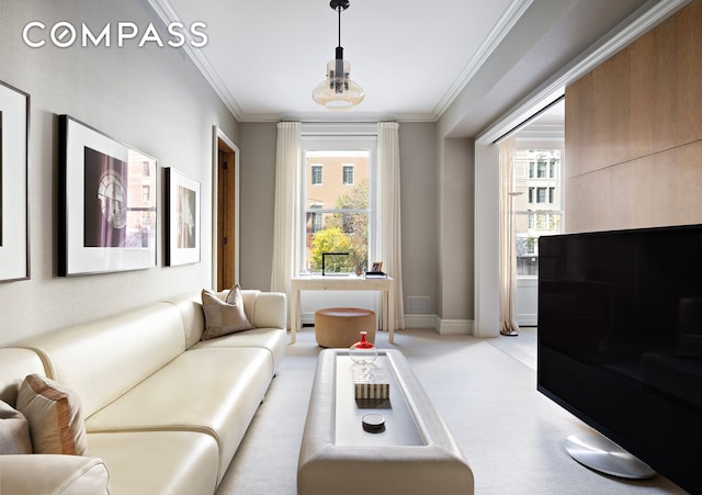 565 Park Ave Unit 2, New York City, NY 10065 - living room with healthy amount of natural light, ornamental molding, light colored carpet, and baseboards