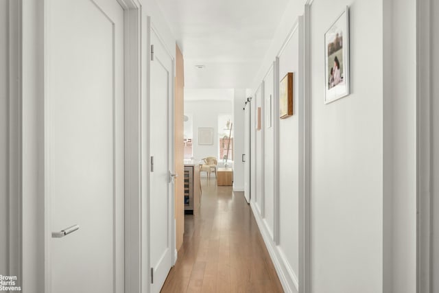 350 W 71st St Unit 2F, New York City, NY 10023 - corridor featuring wood finished floors and wine cooler