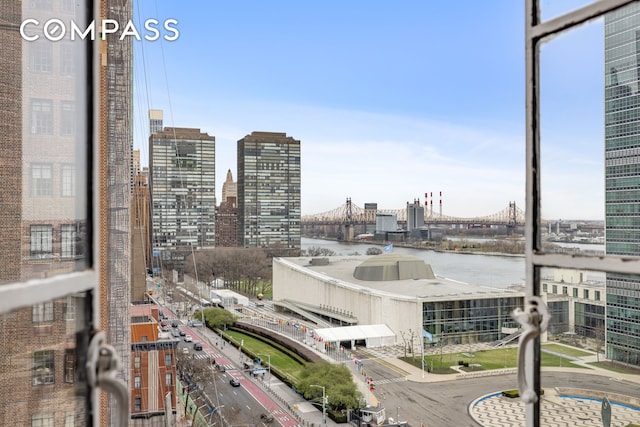25 Tudor City Pl Unit 1101, New York City, NY 10017 - view of city with a notable bridge and a nearby body of water