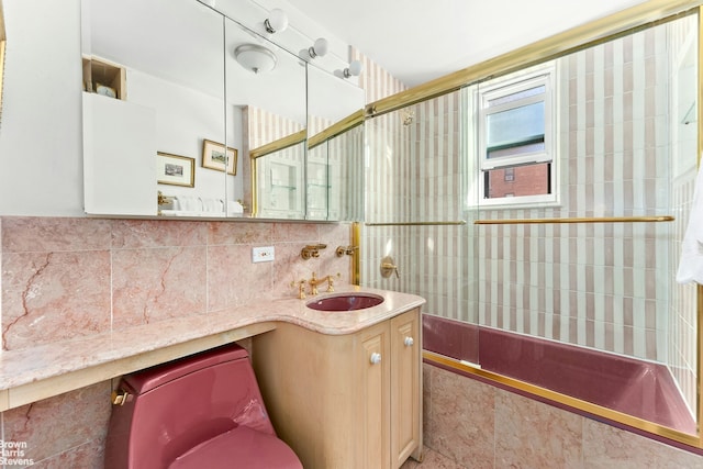 11 Riverside Dr Unit 8Ew, New York City, NY 10023 - full bathroom with vanity, tasteful backsplash, tiled shower / bath combo, and tile walls