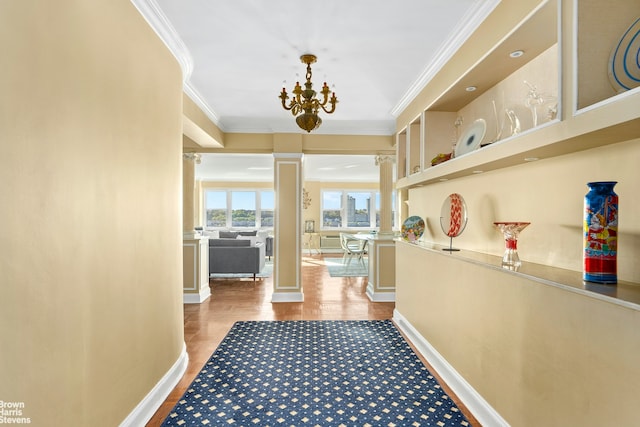 11 Riverside Dr Unit 8Ew, New York City, NY 10023 - hall with ornate columns, ornamental molding, wood finished floors, a chandelier, and baseboards