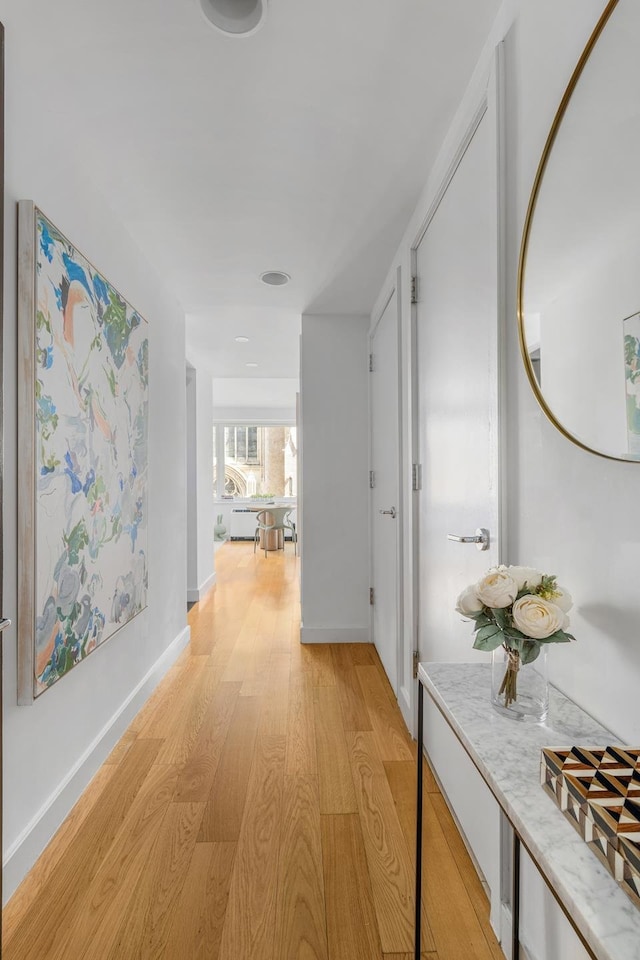 408 E 79th St Unit 3B, New York City, NY 10075 - corridor with light wood-type flooring and baseboards