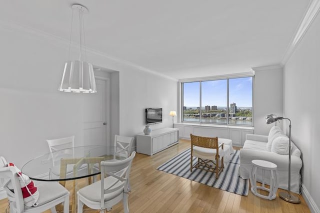 200 Riverside Blvd Unit 30-B, New York City, NY 10069 - dining area featuring light wood-type flooring and ornamental molding