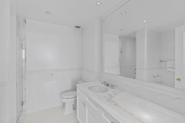 200 Riverside Blvd Unit 30-B, New York City, NY 10069 - full bathroom featuring toilet, vanity, a stall shower, and recessed lighting