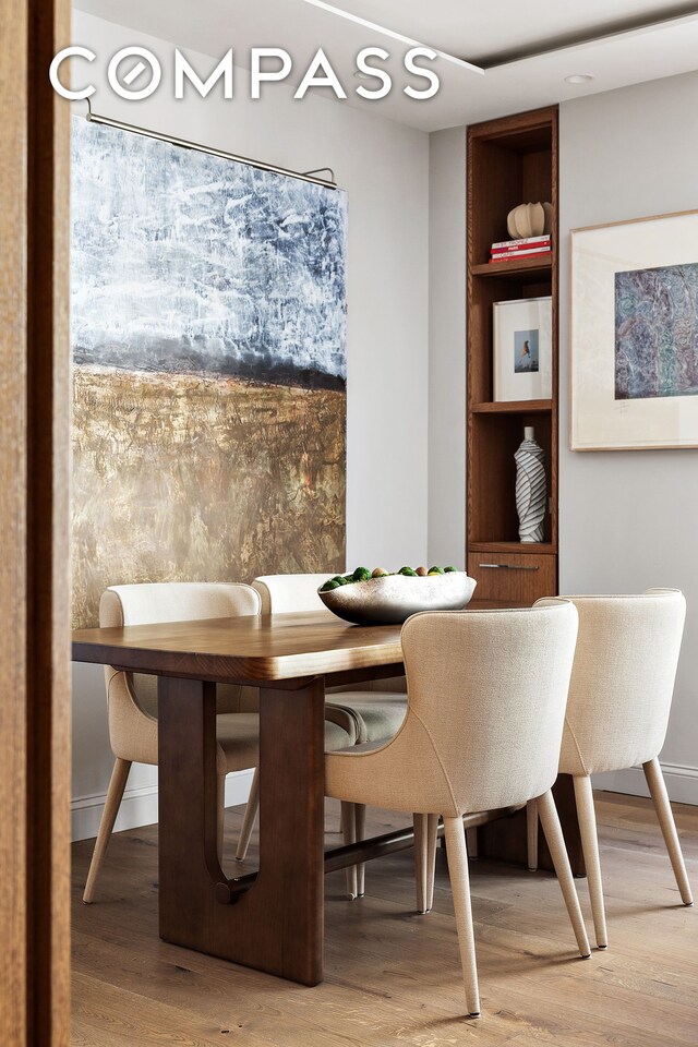 151 W 17th St Unit 4G, New York City, NY 10011 - dining room with light wood-type flooring