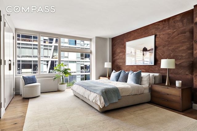 bedroom featuring wood finished floors