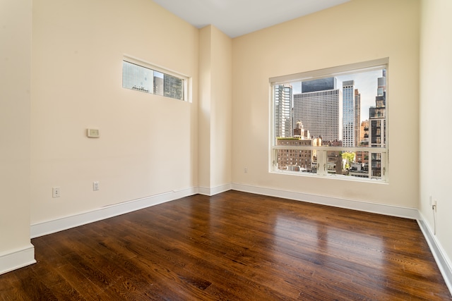 250 E 49th St Unit 10A, New York City, NY 10017 - unfurnished room featuring wood finished floors and baseboards