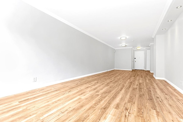 305 E 24th St Unit 3-T, New York City, NY 10010 - empty room featuring light wood-style flooring, baseboards, and crown molding