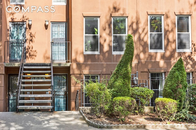 exterior space with stucco siding