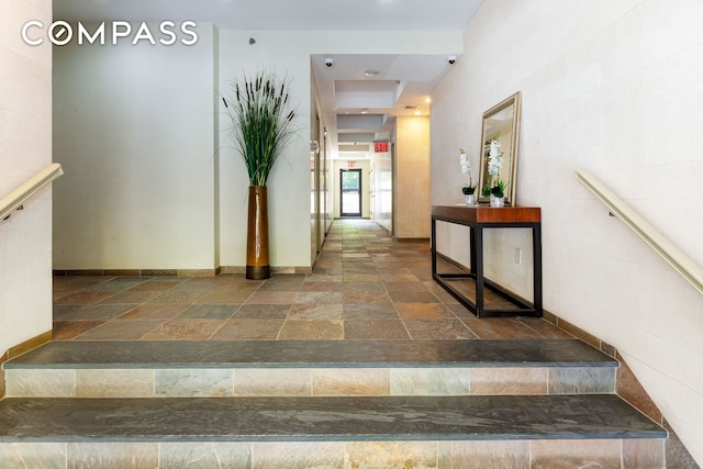 416 E 117th St Unit 5A, New York City, NY 10035 - stairway featuring stone tile flooring and baseboards
