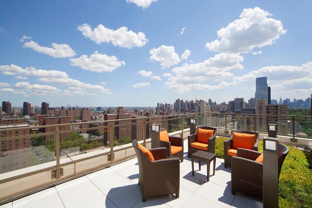 1280 5th Ave Phg, Phg, New York City, NY 10029 - view of patio with a view of skyline, a balcony, and an outdoor hangout area