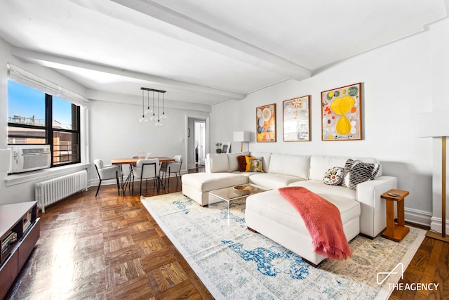 living room featuring beamed ceiling, radiator, and cooling unit