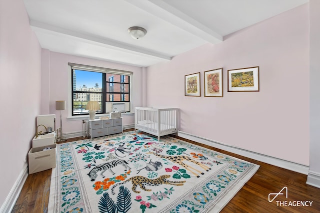 35 W 92nd St Unit 8A, New York City, NY 10025 - bedroom featuring beamed ceiling, wood finished floors, and baseboards
