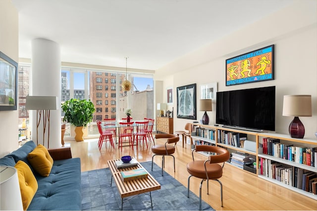 245 W 99th St Unit 7B, New York City, NY 10025 - living area featuring wood finished floors