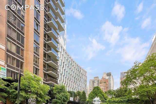 view of property with a city view