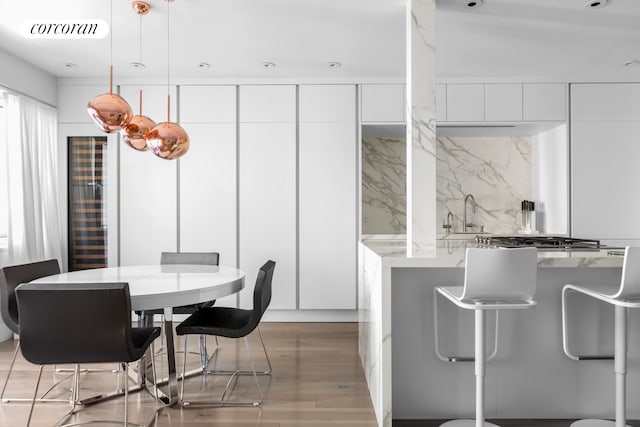 dining room featuring light wood-style floors