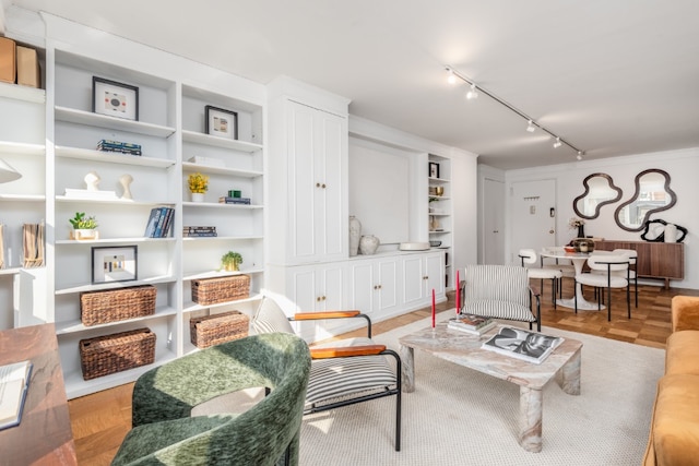 77 7th Ave Unit 7Kk, New York City, NY 10011 - living area with track lighting and built in shelves