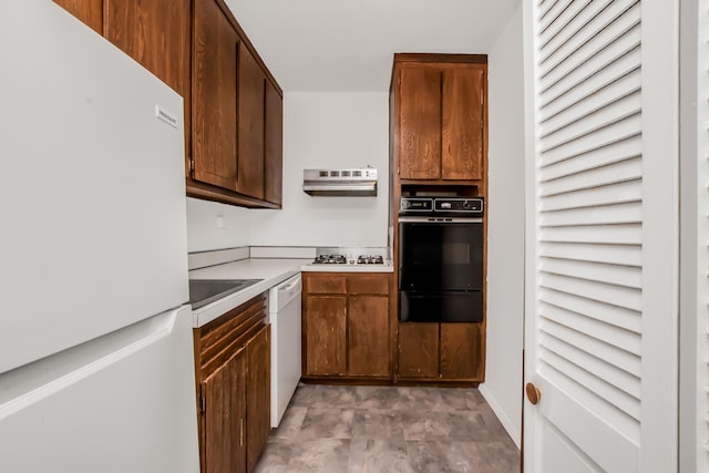 555 Kappock St Unit 7-M, New York City, NY 10463 - kitchen with white appliances, a warming drawer, light countertops, and ventilation hood