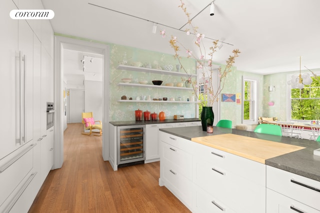 61 Pierrepont St Unit 51/52, New York City, NY 11201 - indoor dry bar with beverage cooler and light wood finished floors