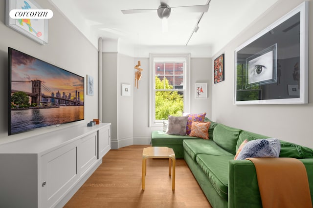 61 Pierrepont St Unit 51/52, New York City, NY 11201 - living area featuring rail lighting, light wood finished floors, and a ceiling fan