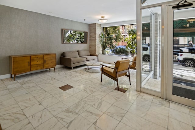 living room featuring marble finish floor
