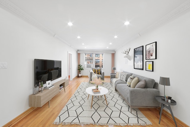 63-61 99th St Unit A-15, New York City, NY 11368 - living area featuring crown molding, light wood-style floors, recessed lighting, and baseboards