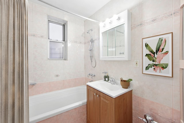 63-61 99th St Unit A-15, New York City, NY 11368 - full bathroom featuring tiled shower / bath, tile walls, and vanity
