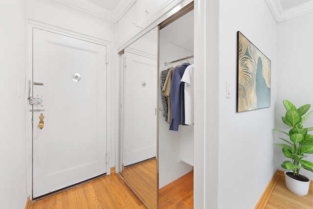 63-61 99th St Unit A-15, New York City, NY 11368 - entryway with ornamental molding and light wood finished floors