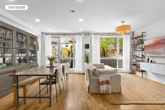 sitting room featuring wood finished floors and recessed lighting