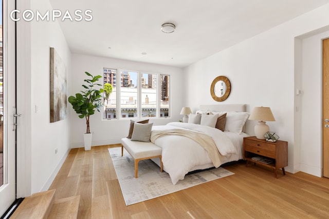 120 E 29th St Phb, Phb, New York City, NY 10016 - bedroom featuring light wood-style floors and baseboards