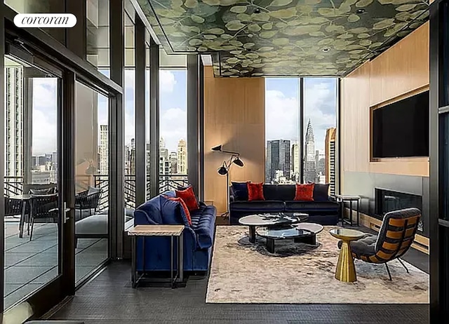 living room featuring a wall of windows