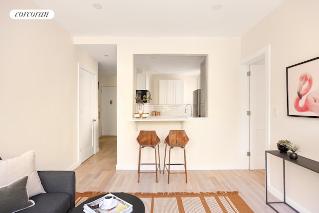 41 Prospect Park SW Unit 2B, New York City, NY 11215 - living room with light wood-type flooring and baseboards
