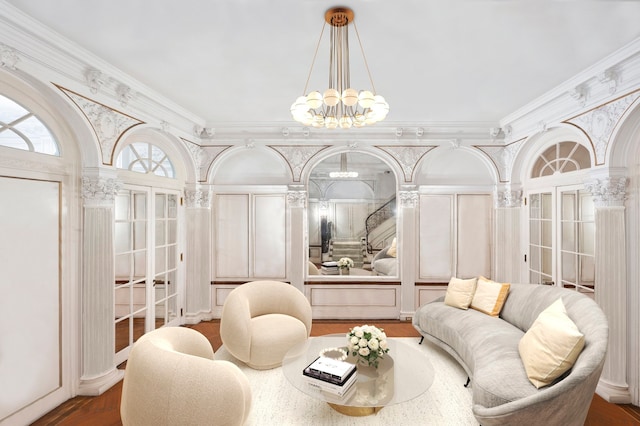18 E 76th St, New York City, NY 10021 - living room featuring a chandelier, wood finished floors, and crown molding