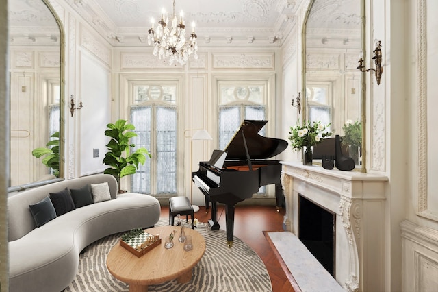 18 E 76th St, New York City, NY 10021 - sitting room featuring crown molding, dark wood-style floors, a chandelier, and a high end fireplace