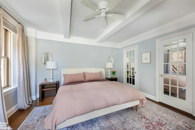 136 Waverly Pl Unit 5E, New York City, NY 10014 - bedroom featuring beamed ceiling, baseboards, dark wood finished floors, and ceiling fan