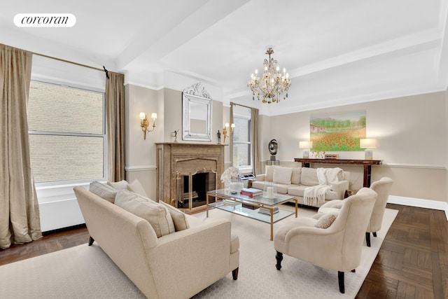 975 Park Ave Unit 7D, New York City, NY 10028 - living area featuring a chandelier, a premium fireplace, and baseboards