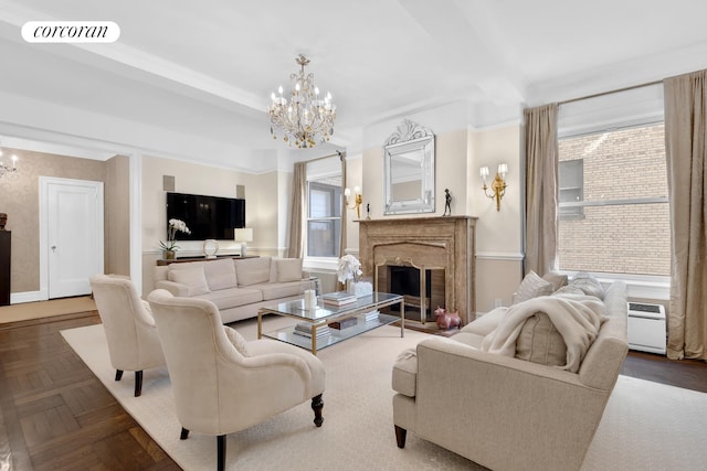 975 Park Ave Unit 7D, New York City, NY 10028 - living area featuring a chandelier, a premium fireplace, and a wall unit AC