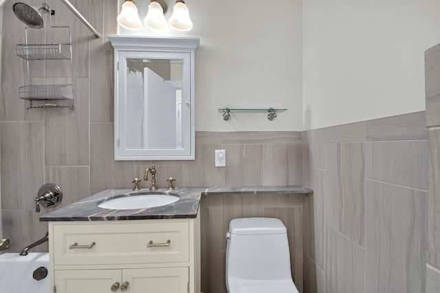 575 Main St Unit 1611, New York City, NY 10044 - full bath featuring tile walls, vanity, toilet, and bathing tub / shower combination