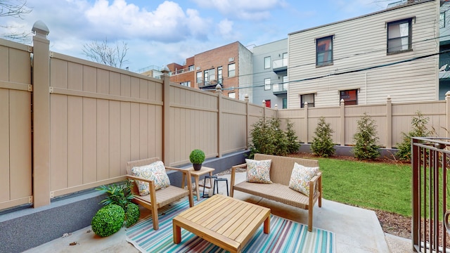 211 Jackson St Unit Garden2, New York City, NY 11211 - view of patio with an outdoor hangout area and a residential view