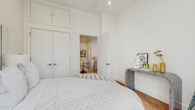 211 Jackson St Unit Garden2, New York City, NY 11211 - bedroom with wood finished floors, a closet, baseboards, and recessed lighting