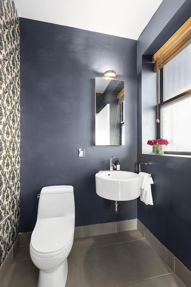 364 Manhattan Ave Unit 1-G, New York City, NY 11211 - bathroom with a sink, toilet, and tile patterned floors