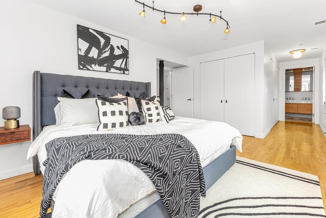 364 Manhattan Ave Unit 1-G, New York City, NY 11211 - bedroom with a closet, light wood finished floors, and baseboards