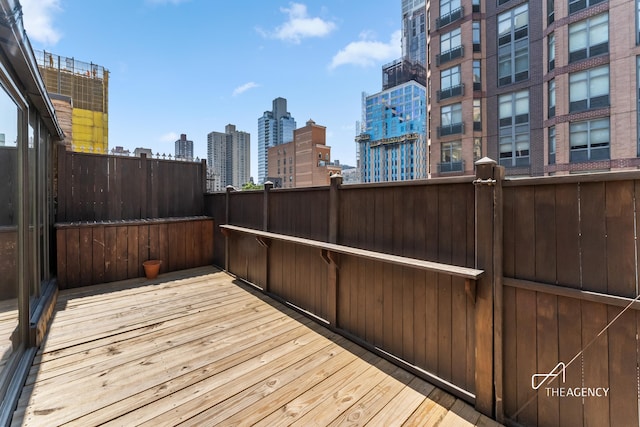 deck featuring a skyline view
