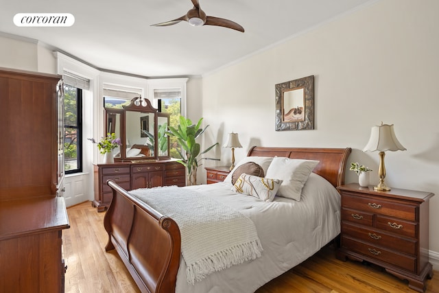62 Rutland Rd, New York City, NY 11225 - bedroom with light wood finished floors, multiple windows, ornamental molding, and a ceiling fan
