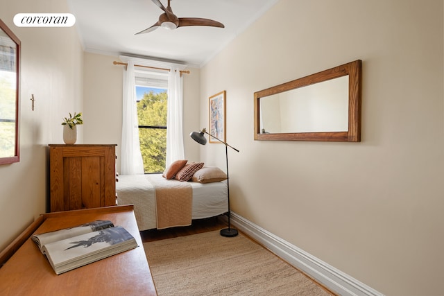 62 Rutland Rd, New York City, NY 11225 - bedroom featuring baseboards, crown molding, wood finished floors, and ceiling fan