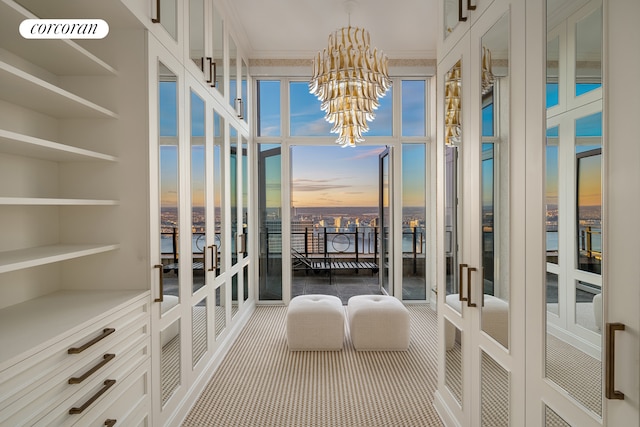 30 Park Pl Unit Ph77A, New York City, NY 10007 - sunroom with a water view and a chandelier
